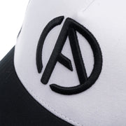 ABSOLUTE360 Logo Trucker Hat in white with black mesh, detailed embroidered logo